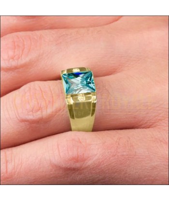 Chevalière de luxe en or jaune : la pierre d'aquamarine et diamants rembourrage situé sous